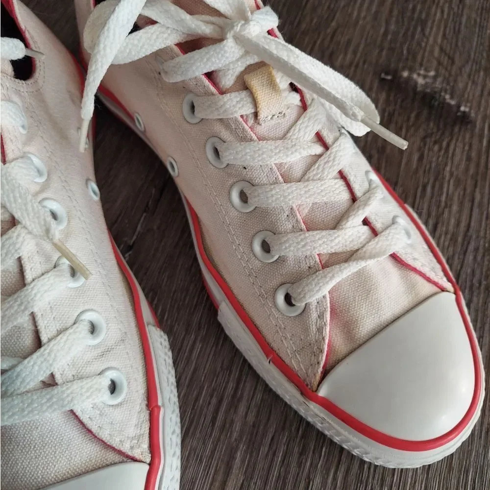 Converse sneakers off